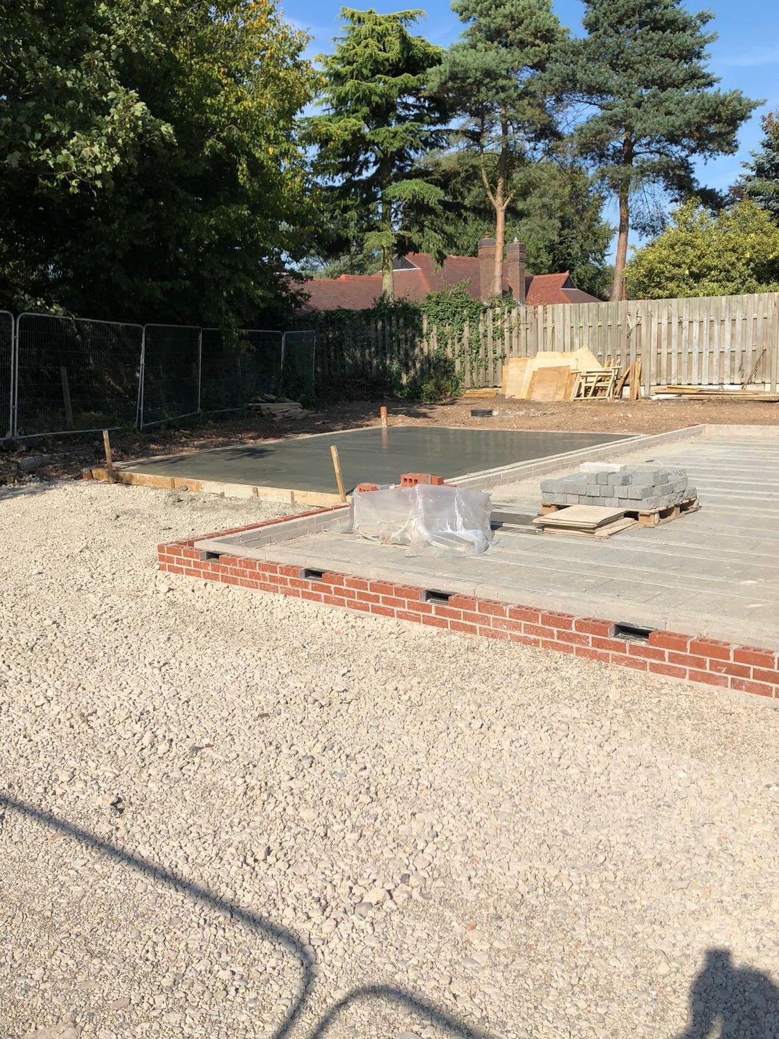 Slab with a brick plinth on a stone working area