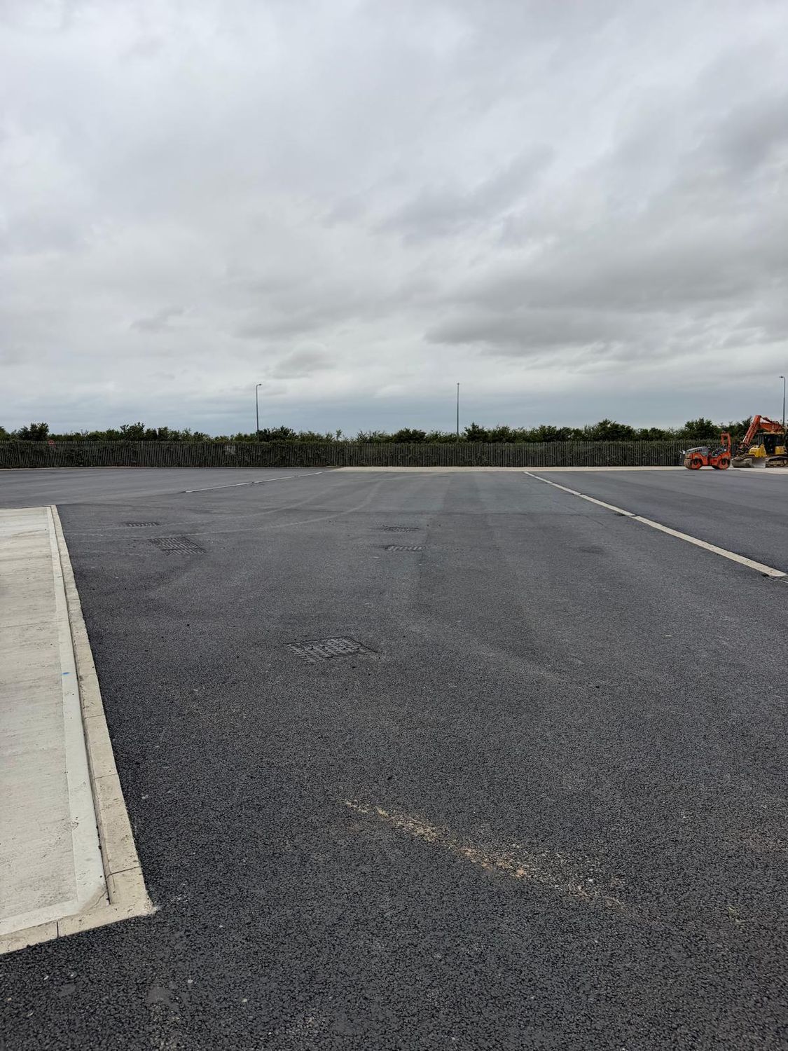 Tarmac surfacing with new kerb lines