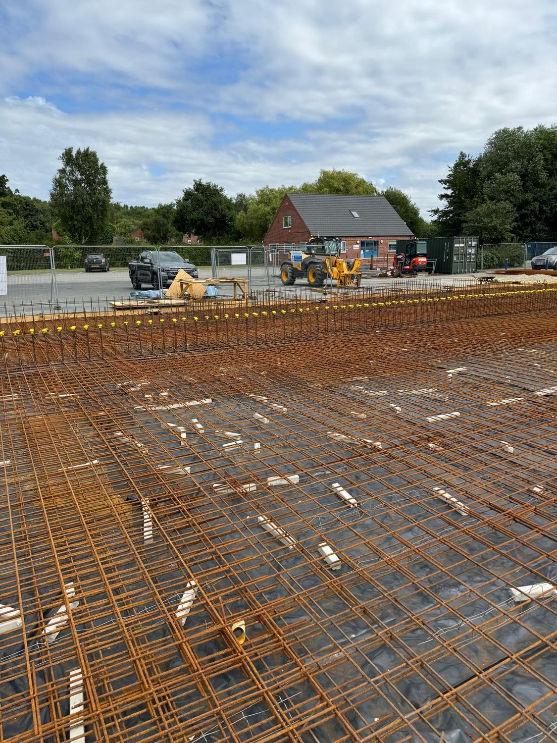 Two layers of mesh reinforcement fixed for a raft foundation